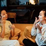 Two friends enjoy a relaxing skincare session at home, enhancing their beauty routines together.